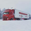 Lastebil fra Vroegindewey på en snødekt vei i Skandinavia