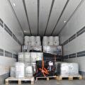 Lading wordt geladen of vastgezet in een trailer van Vroegindewey