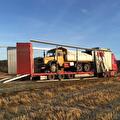 Lading wordt geladen of vastgezet in een trailer van Vroegindewey