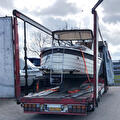 Lading wordt geladen of vastgezet in een trailer van Vroegindewey