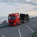 Vrachtwagen van Vroegindewey bij de haven
